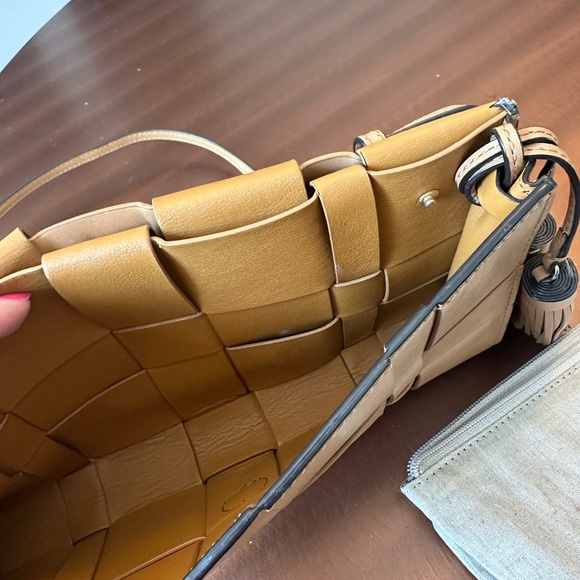 Michael Kors Woven Leather Clutch with Tassels and Strap Tan - Picture 11 of 11